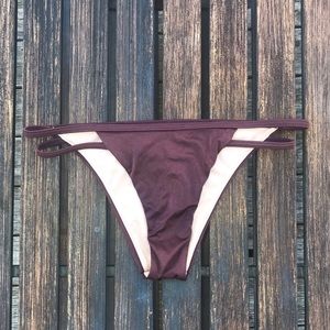 Purple Victoria’s Secret bikini bottoms